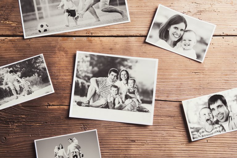 Photos On A Table Phillips Print
